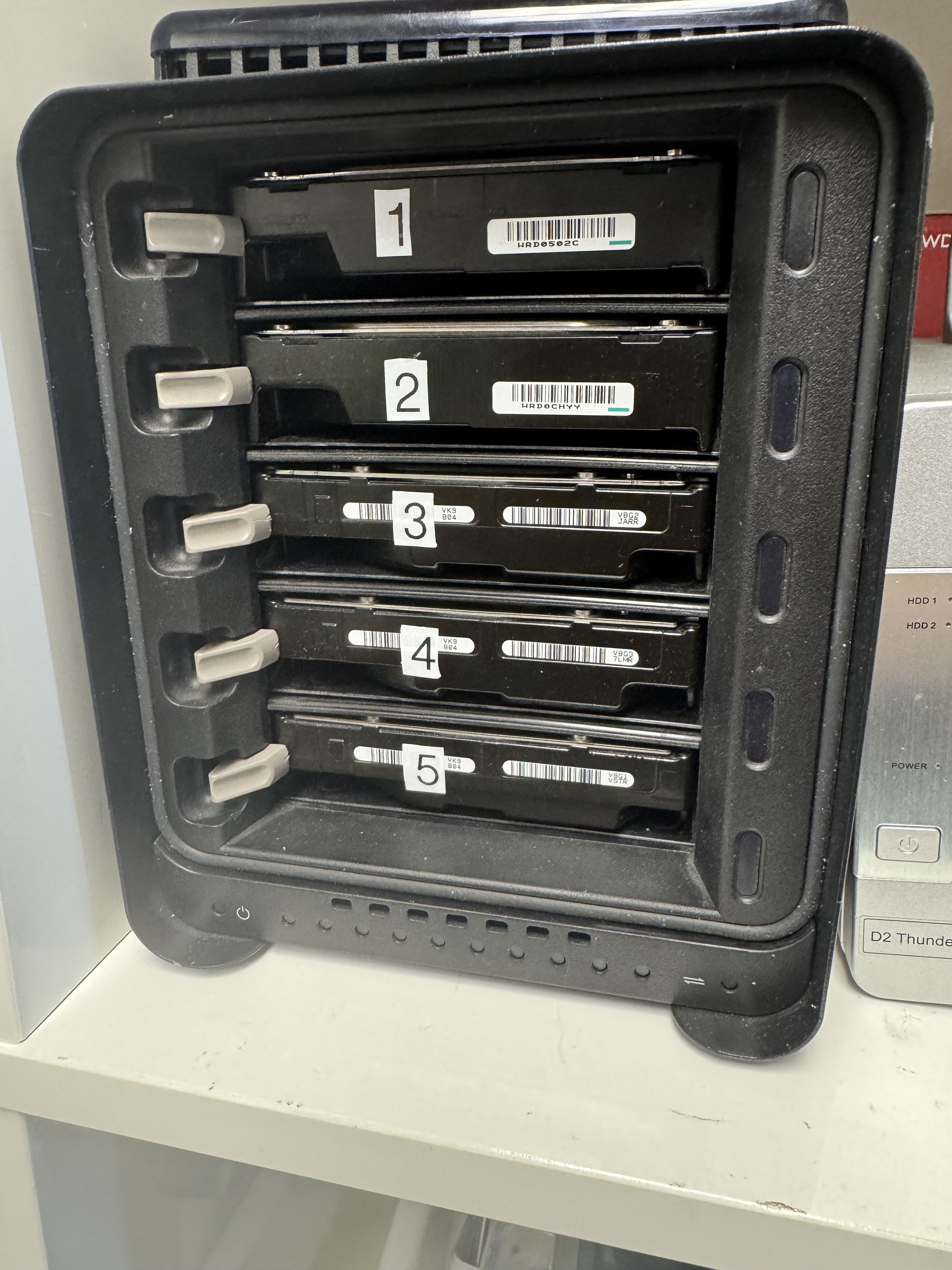 Five-drive Drobo storage system prepared for RAID data recovery